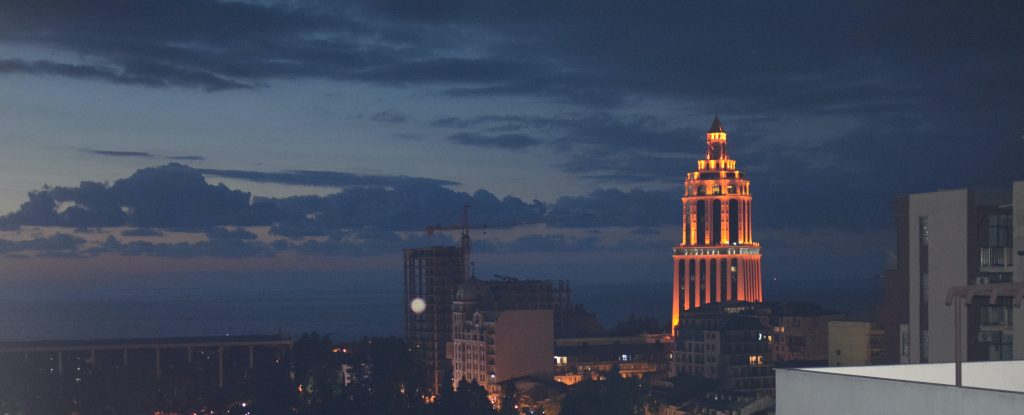 Sheraton hotel and casino  at night with black sea in background