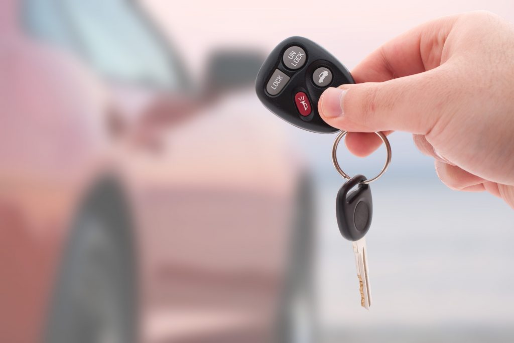 hand holding keys for car rental tbilisi